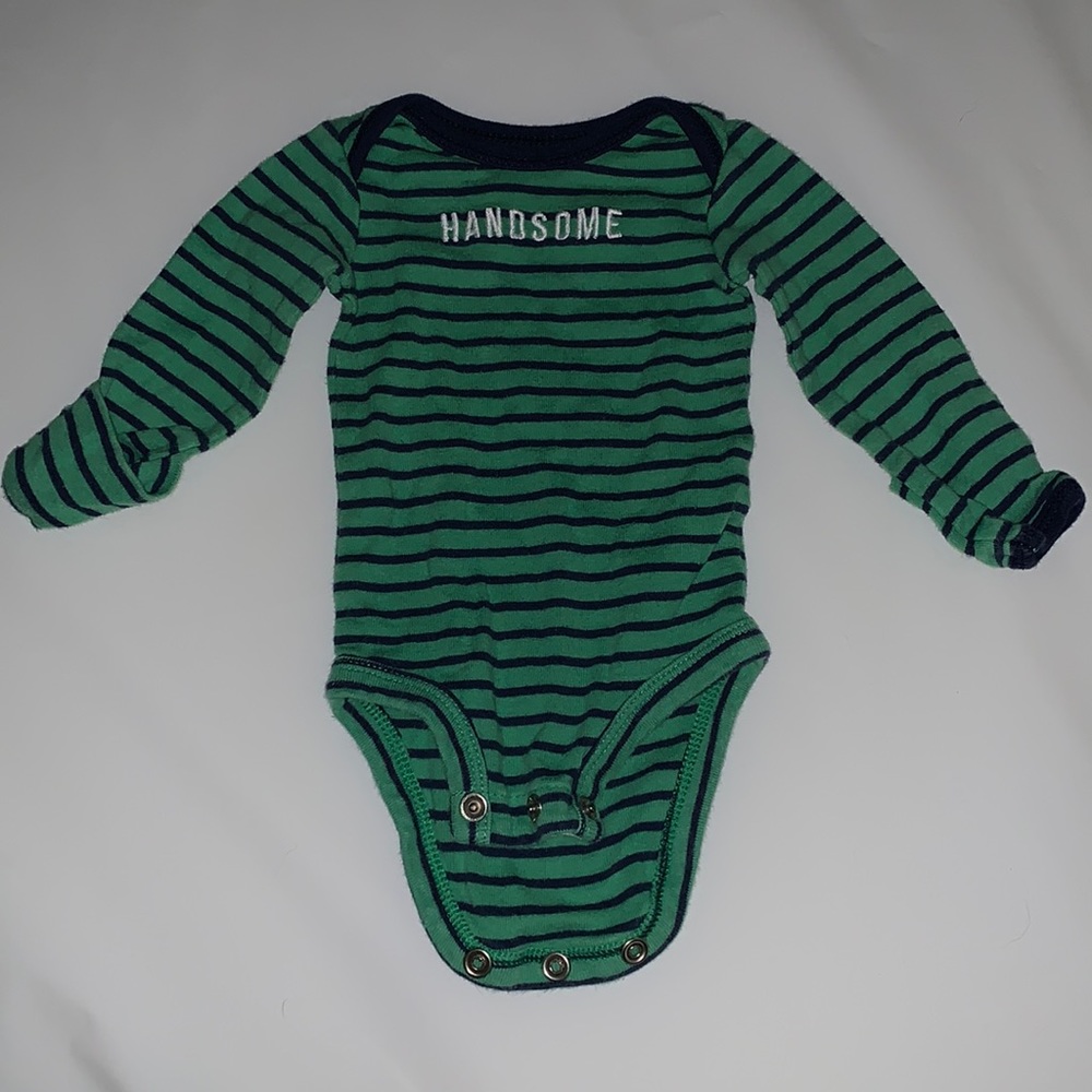 Carters newborn. Sleeves can hold over to protect hands
